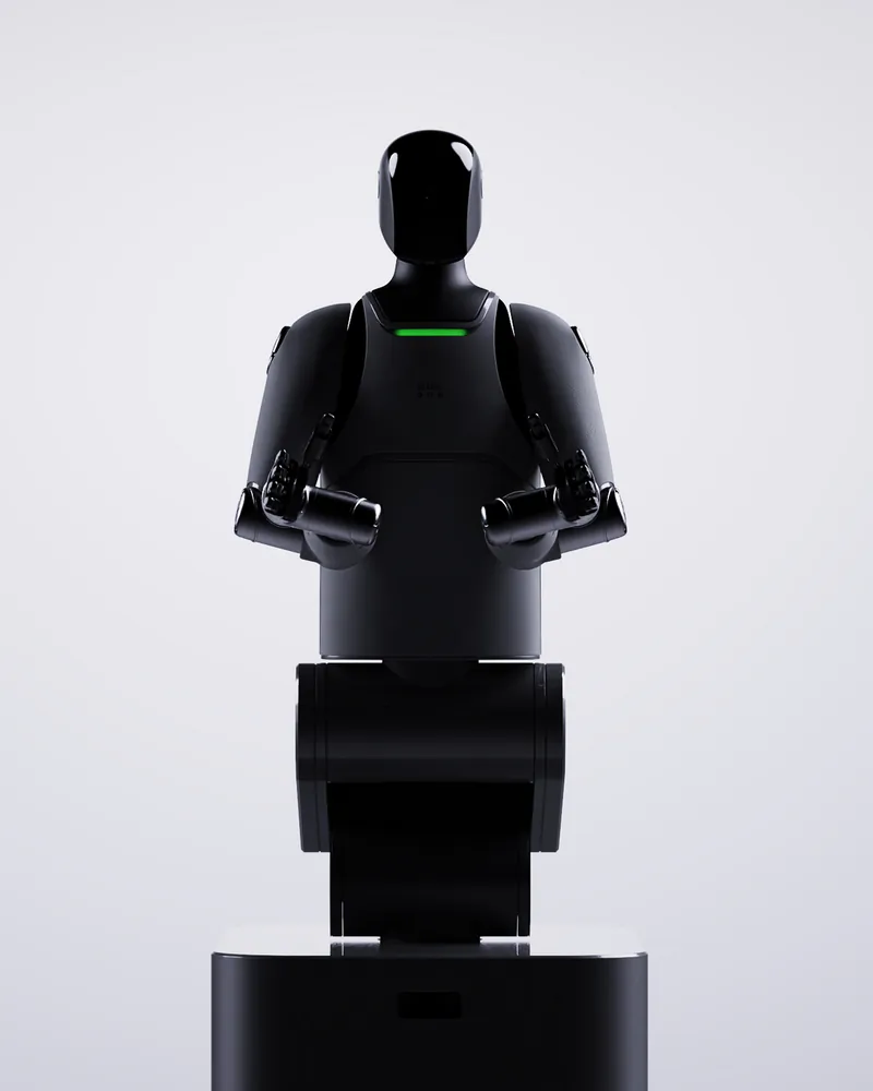 MARK One, black, standing on its base in a soft grey studio
