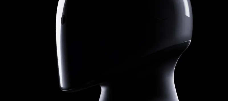 The MARK One head in profile, black glass in the dark
