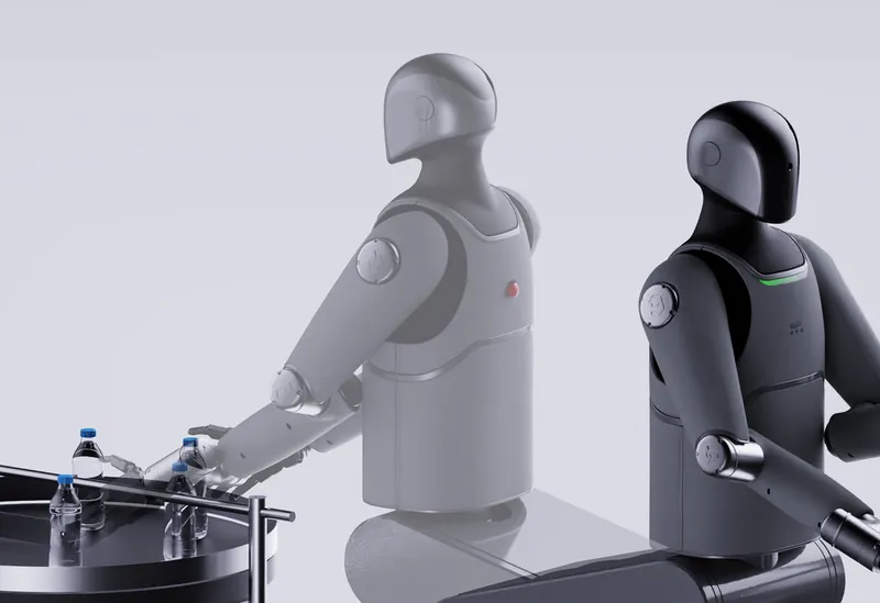 Two MARK One robots working at a bottling line
